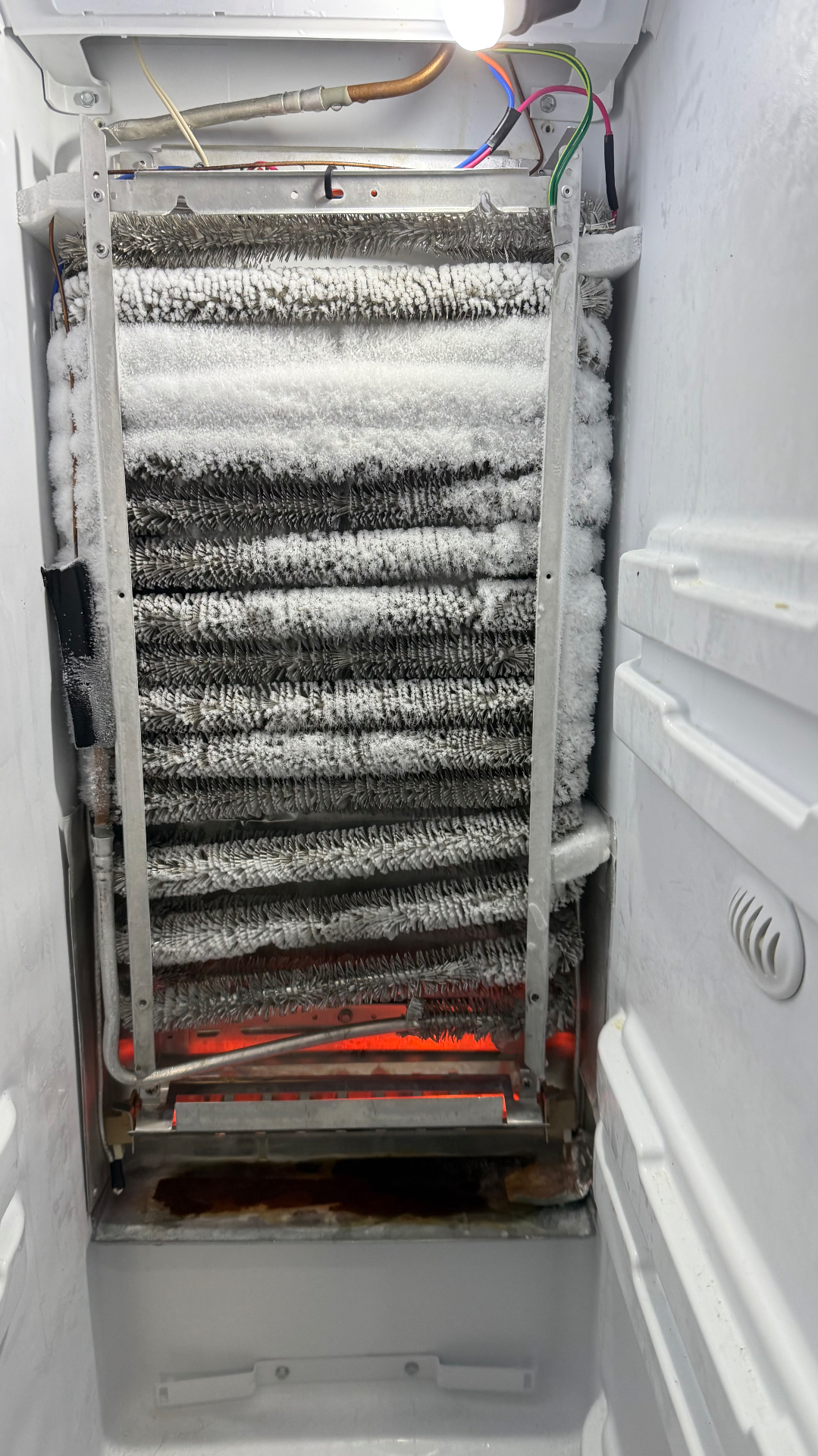 Ice buildup across an exposed cooling coil