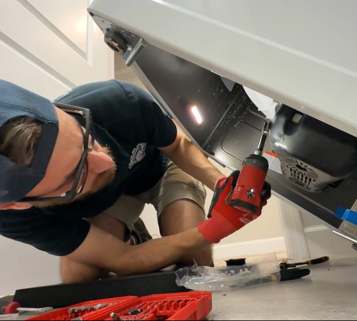 Close inspection beneath a household machine